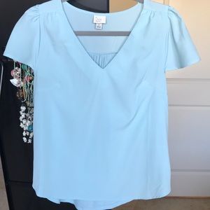 Top with flutter sleeves